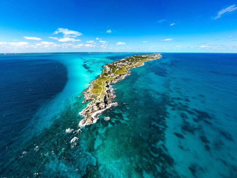 Cancun: Isla Mujeres Premium Catamaran Half-Day Tour - Key Points