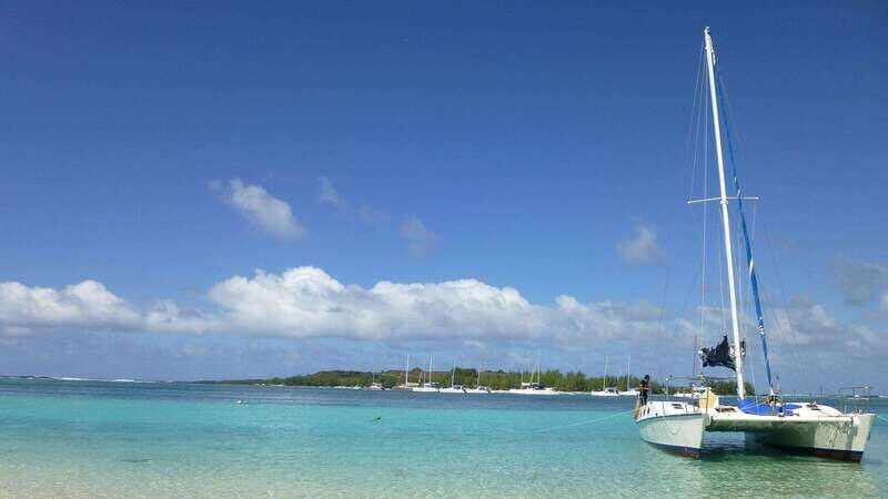 Cancun: Isla Mujeres Premium Catamaran Half-Day Tour - Diving Into the Experience
