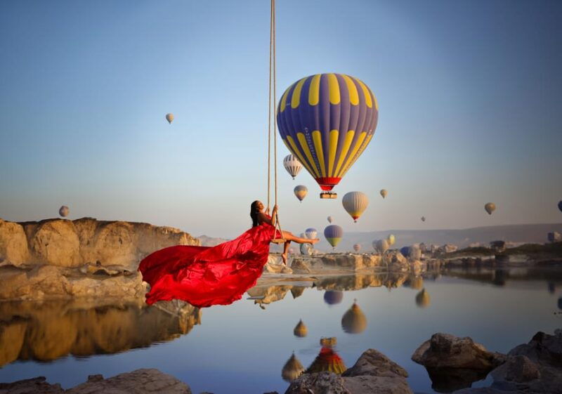 cappadocia-taking-photo-with-swing-at-hot-air-balloon-view