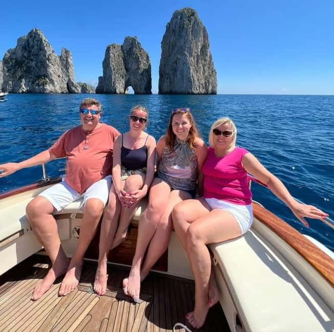 Capri: Boat Tour with Swimming, Limoncello, and Snack - The Charm of Capri by Water