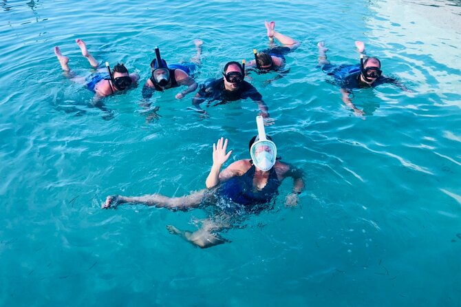 catamaran-party-boat-half-day-trip-with-snorkeling-and-natural-pool
