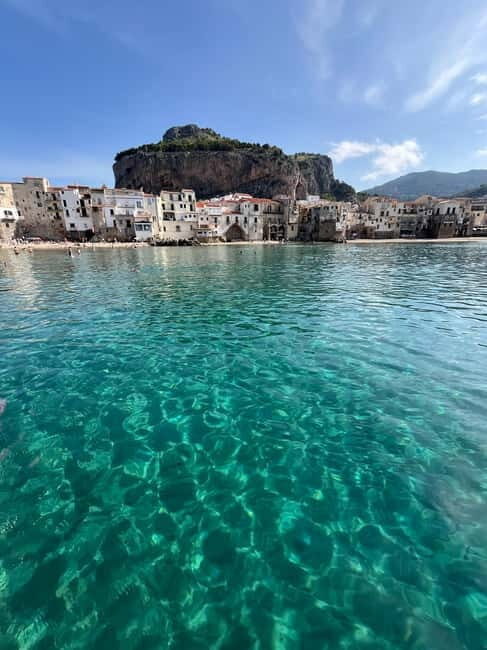 Catamaran tour along the Cefalù coast with aperitif and snorkeling - A Deep Dive into the Cefalù Catamaran Tour