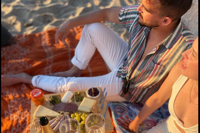 charcuterie-board-and-sunset-at-pristine-beach-with-photos