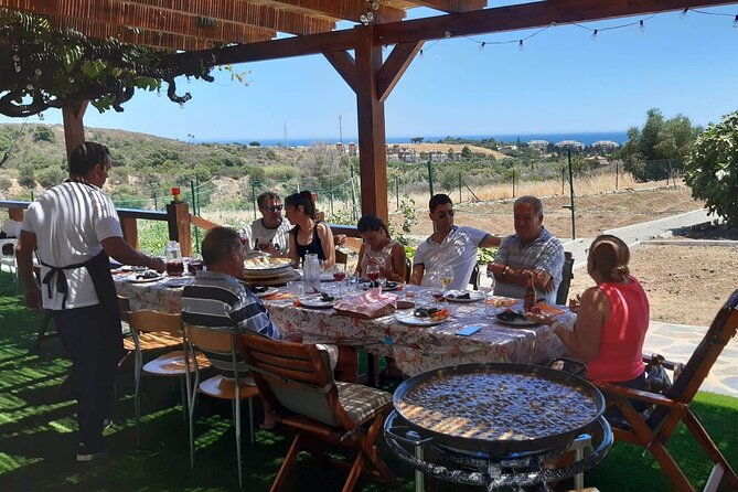 chefcooking-paella-from-our-andalusian-grandmother-at-a-family-farm