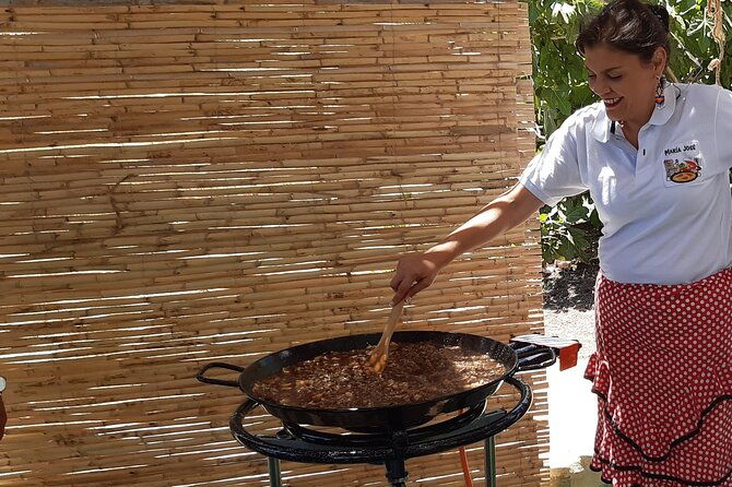chefcooking-paella-from-our-andalusian-grandmother-at-a-family-farm