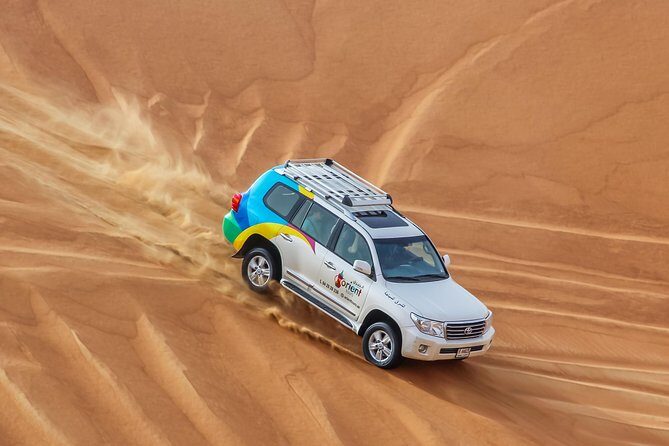 Classic Dubai Desert Safari with BBQ Dinner and Camp activities - Key Points