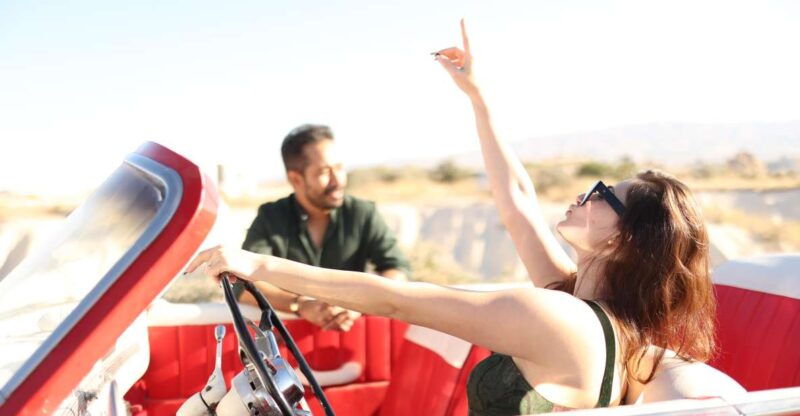 classic-vintage-car-jeep-safari-shooting-with-camels