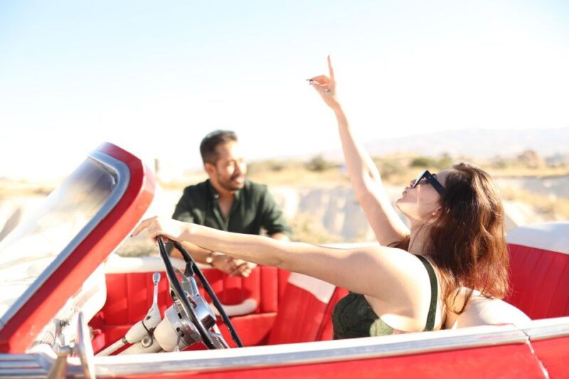 classic-vintage-car-jeep-safari-shooting-with-camels