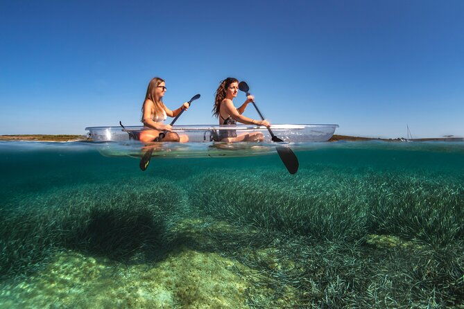 clear-kayak-tour-to-canyon-island-cliffs-small-cave