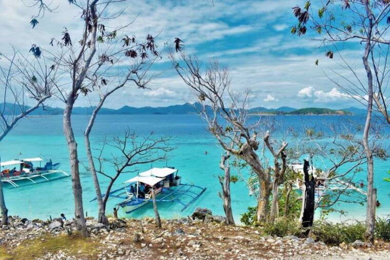 coron-coastal-cliffs-beach-malcapuya-island-hopping-tour