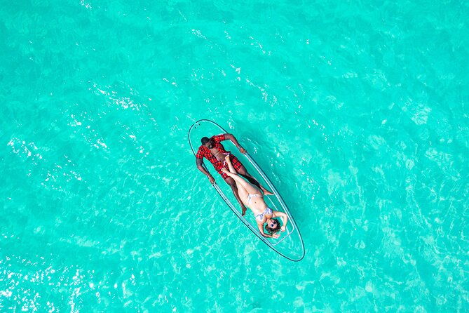 couples-clear-kayak-drone-photoshoot-in-turks-and-caicos