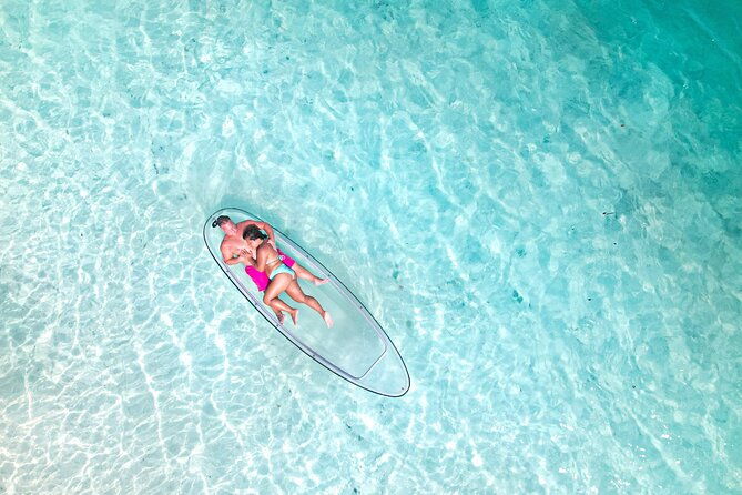 couples-clear-kayak-drone-photoshoot-in-turks-and-caicos