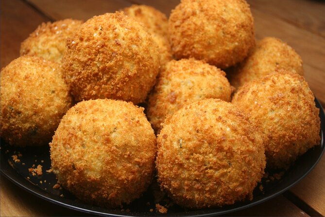course-of-arancini-and-almond-paste-in-catania