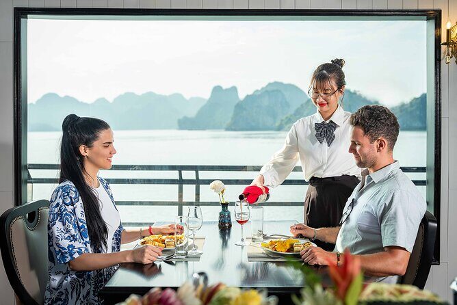 Cozy Bay Halong 5-Star Day Cruise, Transfer, Buffet, Cave & Kayak - Titop Island: Beachside Fun & Panoramic Views