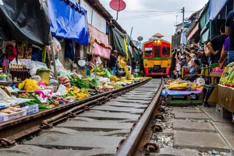 Damnoen Saduak Floating Market, Train with Pickup & Dropoff - Frequently Asked Questions