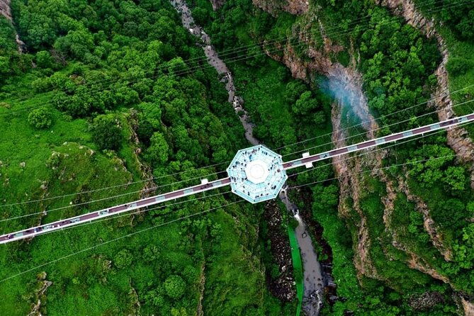 dashbashi-canyon-glass-bridge-bicycle-zip-line-swing-private-full-day-tour