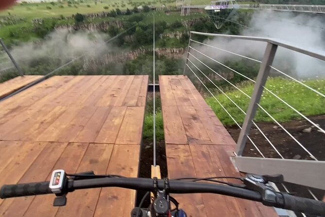 dashbashi-canyon-glass-bridge-bicycle-zip-line-swing-private-full-day-tour