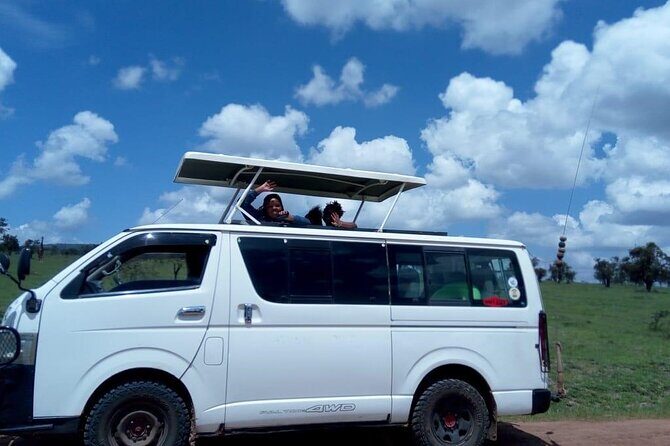 Day Tour to Nairobi National Park and Giraffe Center - Authentic Experiences from Reviews