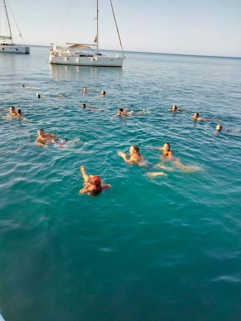 denia-cova-tallada-catamaran-tour-and-swimming-stop