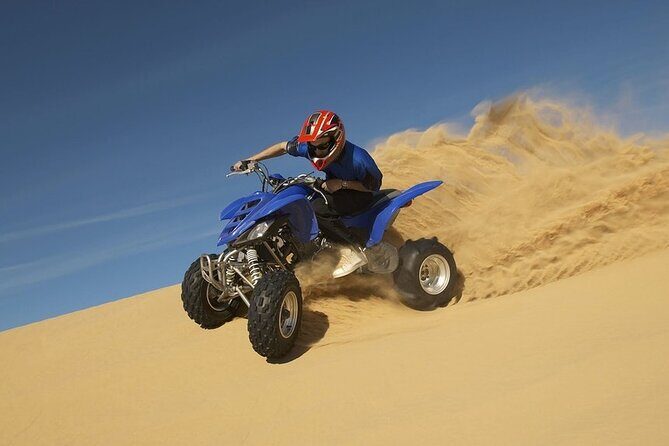 Desert Quad Biking Tour and Sand Boarding with Dinner in Dubai - Key Points