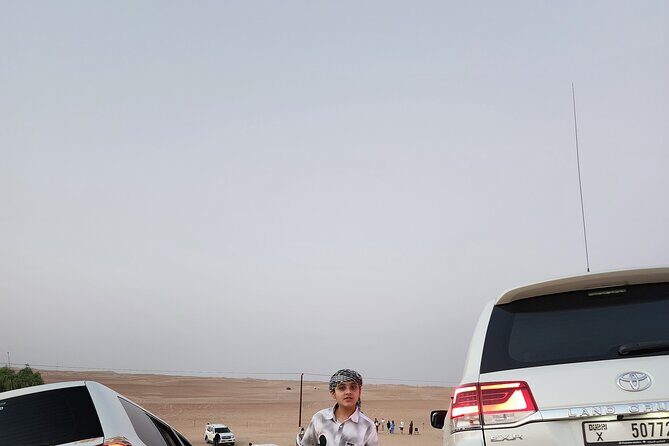 Desert Safari BBQ Dinner, Live Shows, ATV Bikes, Sandboarding - The Guides and Service