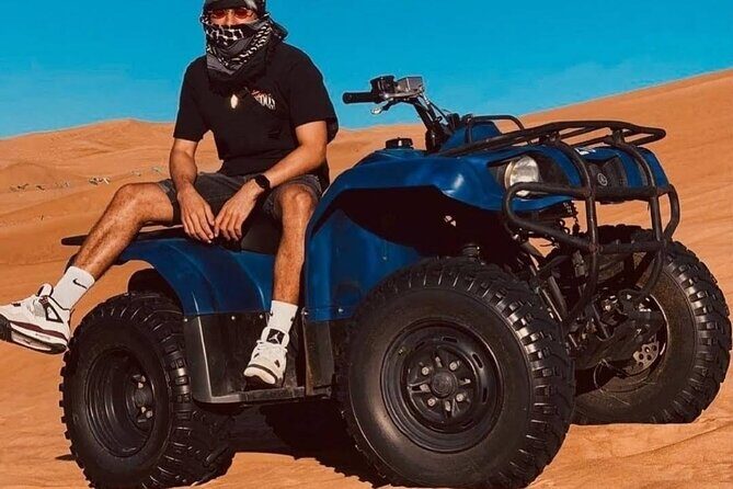 Desert Safari Dubai 25 minutes Quad Bike Free Camel Ride BBQ Dinner - Key Points