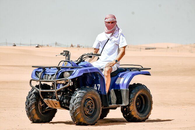 Desert Safari With BBQ Dinner, Quad Bike & Camel Ride from Dubai - An Unforgettable Blend of Adventure and Culture  