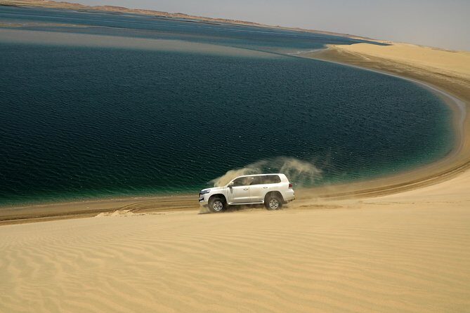 Desert Safari with Camel Ride, Sand Boarding & Inland Sea Tour in Doha - Key Points