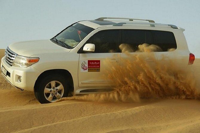 Desert Safari with Quad Bike, Camel Ride, Sand Surf, BBQ & Shows - Exploring the Desert Safari Itinerary