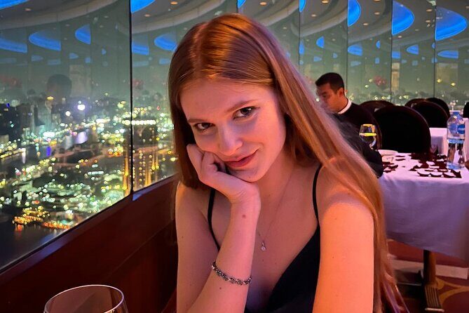 Dinner between clouds by full rotating restaurant - The Sum Up