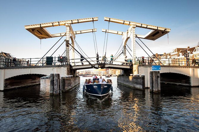 discover-amsterdams-canals-relaxing-open-boat-cruise-adventure-2