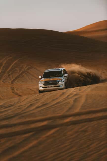 Doha City Tour with Desert Safari and Inland Sea Visit - Key Points