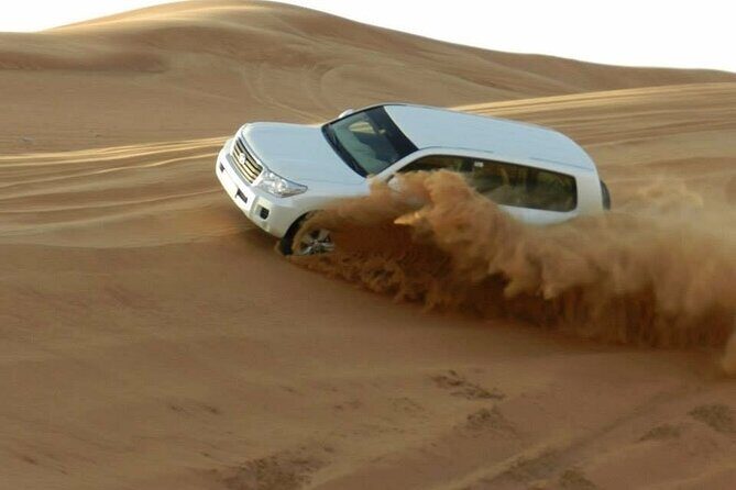 Doha Half Day Desert Safari Dune Bashing CamelRide & Sandboarding - Key Points