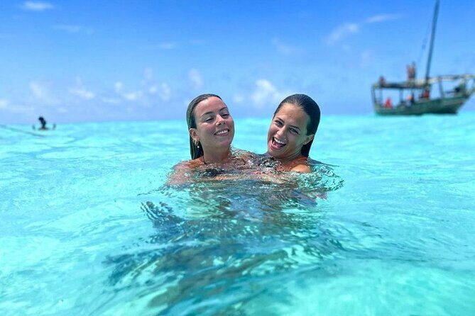 Dolphin Tour & Snorkeling at Mnemba Island - Key Points