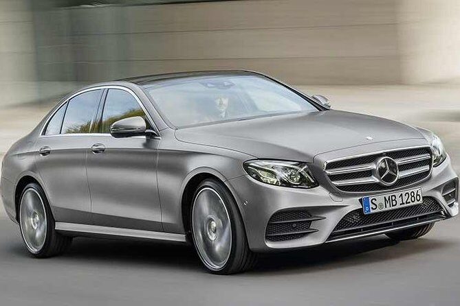 Dubai Airport DXB Round-Trip Private Transfer in Business Car - Key Points