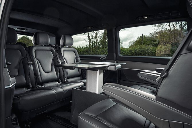 Dubai Airport DXB Round-Trip Private Transfer in Luxury Van - Key Points