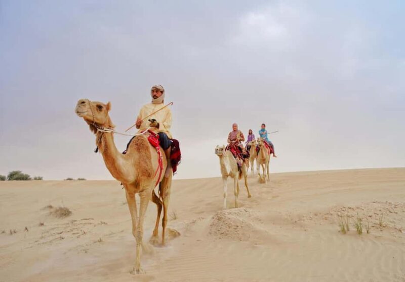 Dubai: Desert Safari, Camel Ride, Sandboard & Buffet Dinner - The Itinerary Breakdown