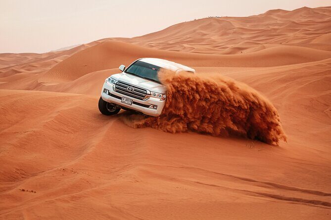 Dubai Desert Safari Dune Bashing, Camel Ride, Sandboarding & BBQ - Key Points