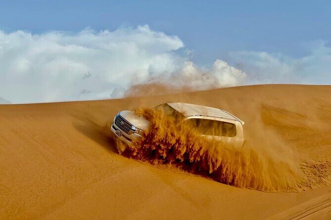 Dubai Desert Safari: Dune Bashing, Camel Ride, Sandsurf & 5* BBQ - Dubai Desert Safari: Dune Bashing, Camel Ride, Sandsurf & 5* BBQ