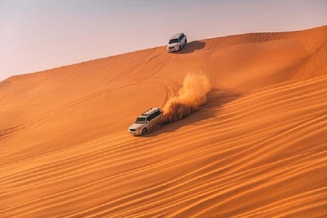 Dubai Desert Safari, Quad Bike, Camel Ride, and Buffet Dinner - Key Points  
