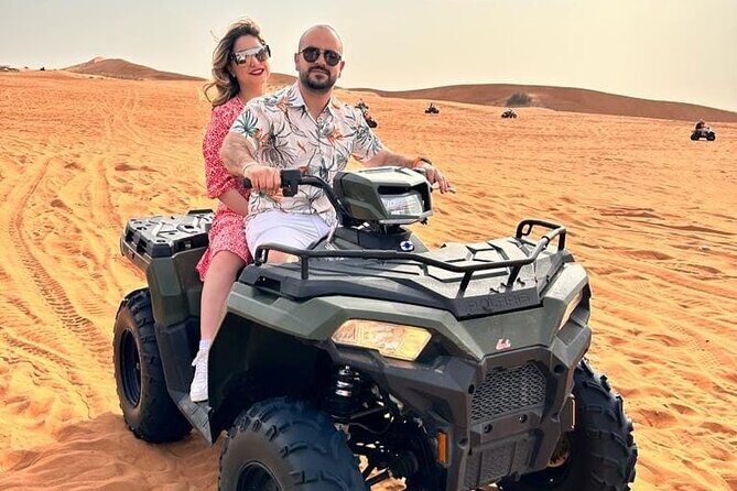 Dubai Desert Safari Sharing with Quad, Shows, Camel and Dinner - The Dune Bashing: Adrenaline and Awe in the Red Sands