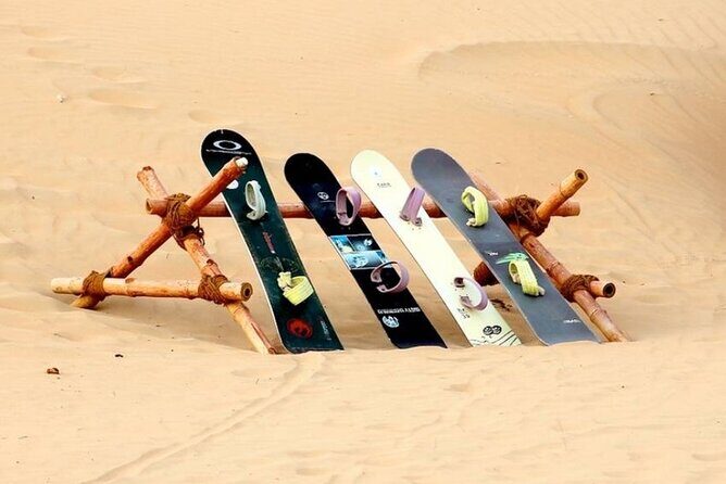 Dubai Desert Safari with Camel Riding, Sand Boarding,BBQ Dinner and 3 Live Shows - The Sum Up