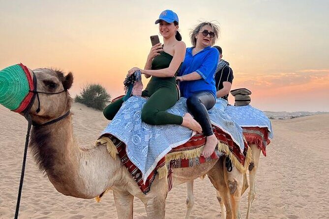 Dubai Dune Bashing with Camel Ride, Sandboarding & BBQ Dinner - A Genuine Look at the Dubai Desert Safari Experience