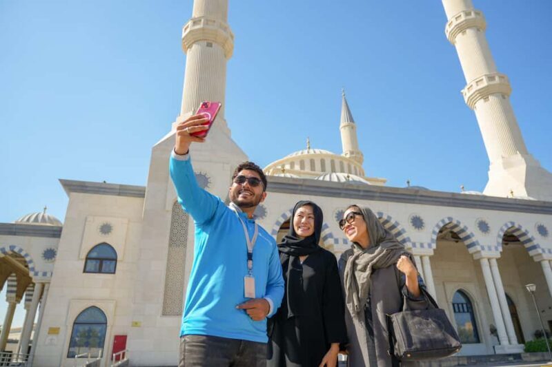 Dubai: Half-Day City Tour with Blue Mosque, Creek, and Souks - Transportation, Guides, and Overall Experience
