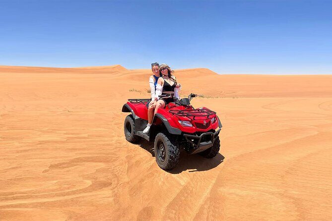 Dubai: Quad Bike Safari, Camels, & Camp with BBQ Dinner - The Camp Experience: Food, Entertainment, and Atmosphere