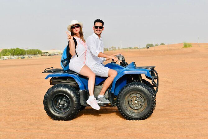 Dubai: Red Dunes Desert Safari, Camel ride, Sandboard, Quad Bike - The Sum Up