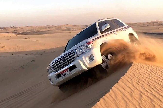 Dubai Red Dunes Desert Safari, With BBQ, Camel Ride, Sand Boarding And Much More - The Sum Up