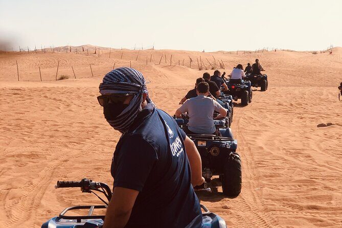 Dubai Red Dunes Quad Bike Tour,Sandboard, Camel ride & BBQ Dinner - Transport, Pricing, and Practicalities