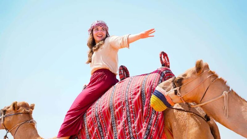 Dubai: Sandboarding, Camel Ride and Red Dune Bashing - A Well-Rounded Experience with Professional Guidance