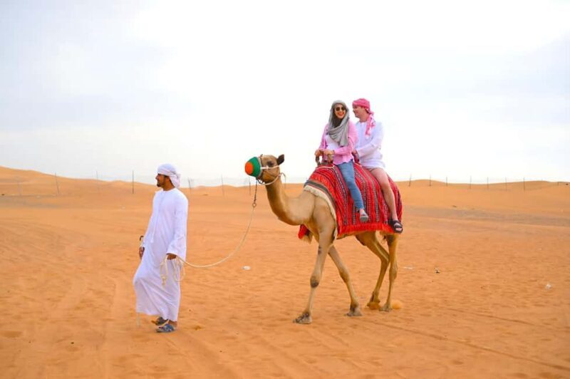 Dubai: Tour with BBQ Dinner, Camel Ride, & Traditional Show - Key Points
